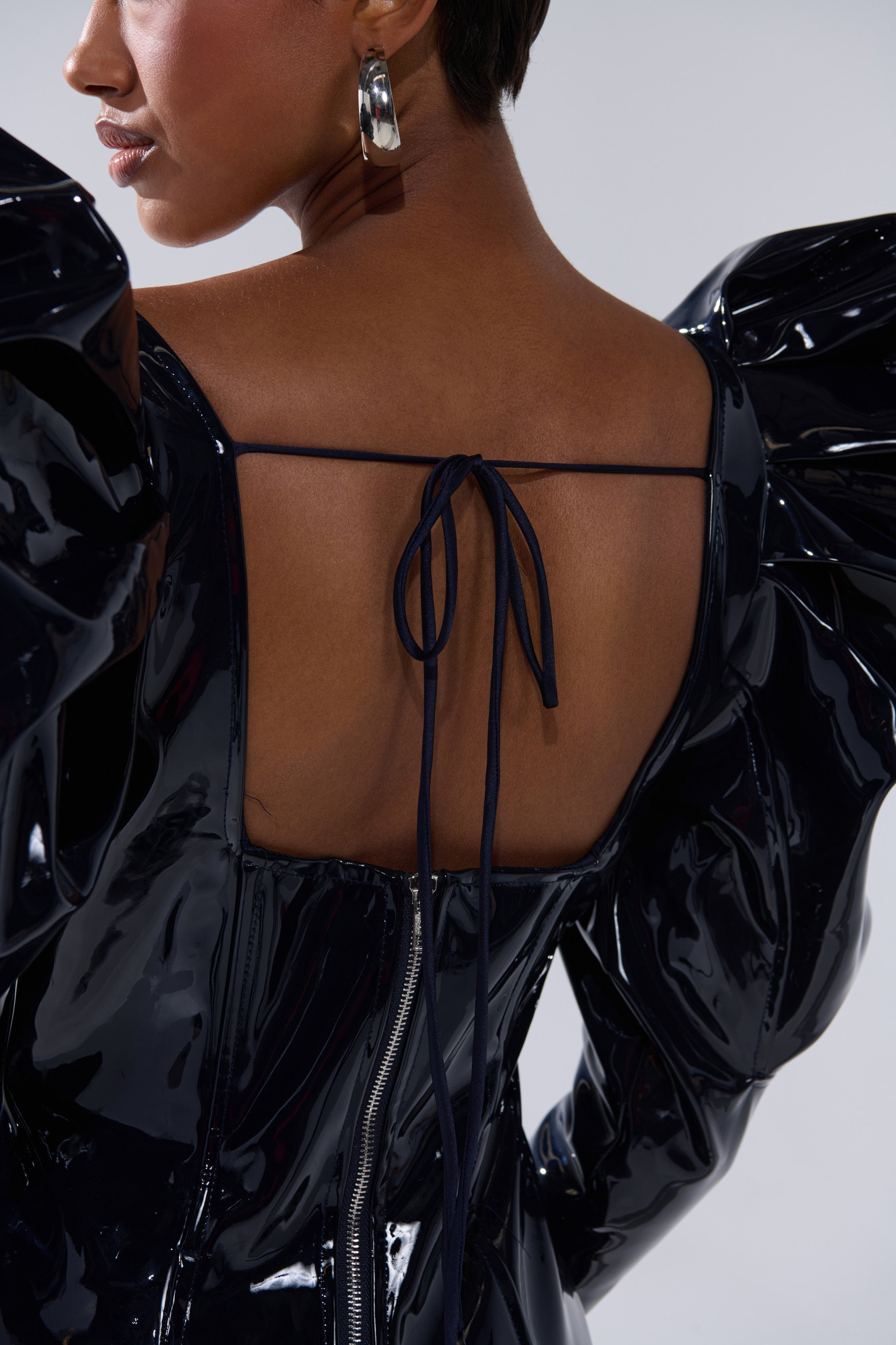 BADDIES ONLY PATENT MINI DRESS IN NAVY